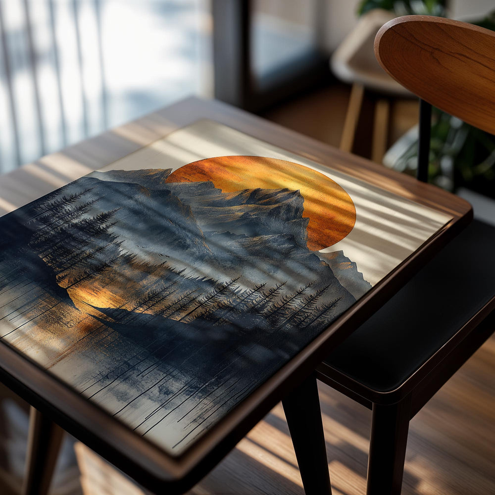 Mountain landscape with a large orange sun and trees reflected in water, as a premium aluminum metal print from GoMetalPrint.
