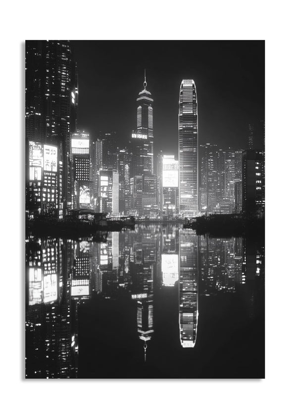 Black and white cityscape at night with reflective water, as a premium aluminum metal print from GoMetalPrint.
