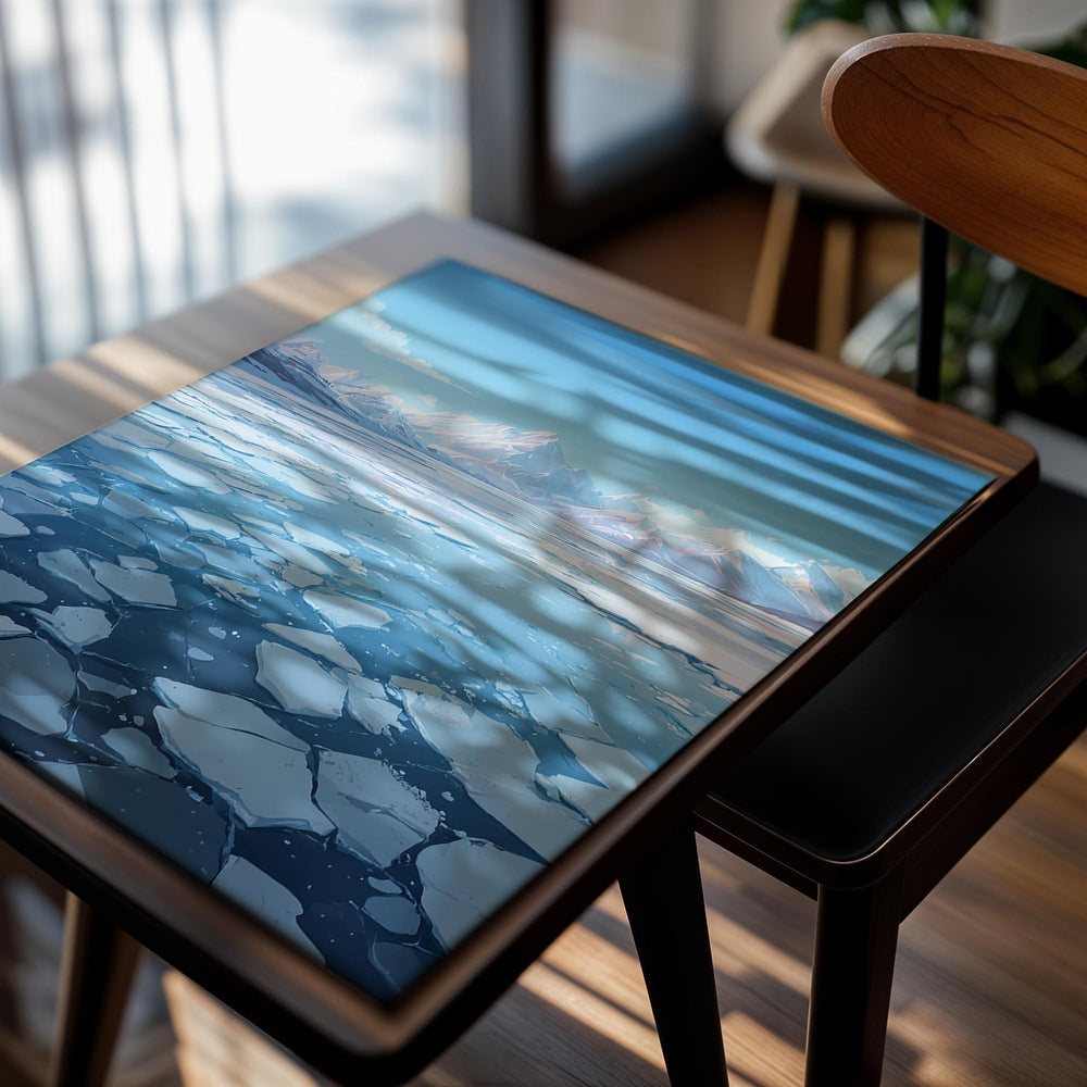 Frozen lake with ice floes and snow-capped mountains under a blue sky, as a premium aluminum metal print from GoMetalPrint.
