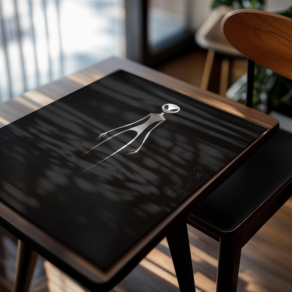 White alien figure on a black background, as a premium aluminum metal print from GoMetalPrint.
