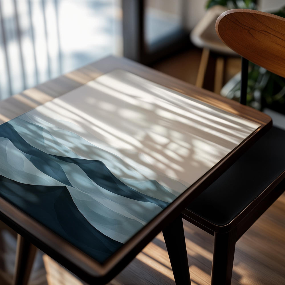 Abstract wave design in blue tones on a white background, as a premium aluminum metal print from GoMetalPrint.
