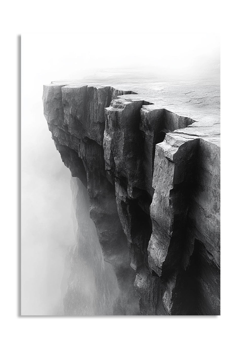 Black and white photograph of a rocky cliff with a waterfall, as a premium aluminum metal print from GoMetalPrint.
