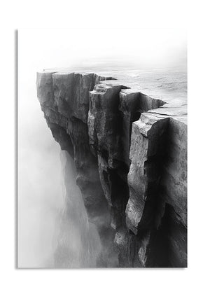 Black and white photograph of a rocky cliff with a waterfall, as a premium aluminum metal print from GoMetalPrint.
