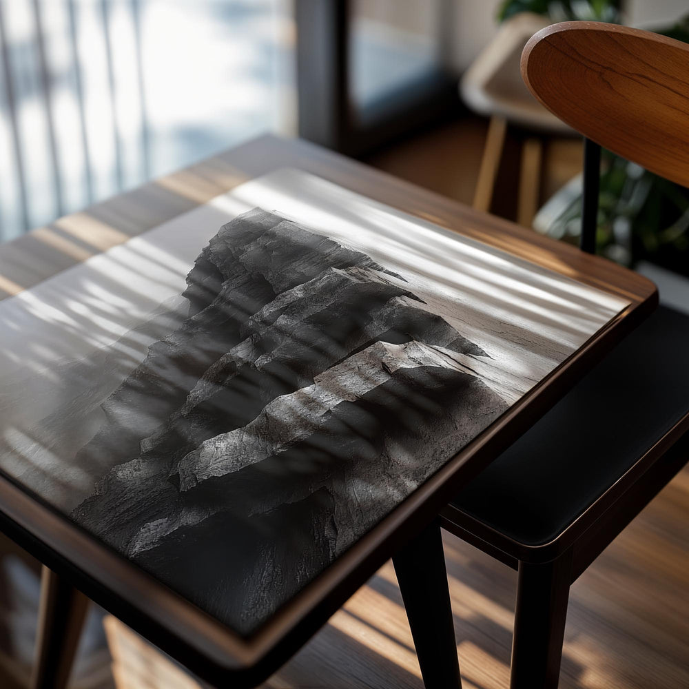 Black and white photograph of a rocky cliff with a waterfall, as a premium aluminum metal print from GoMetalPrint.
