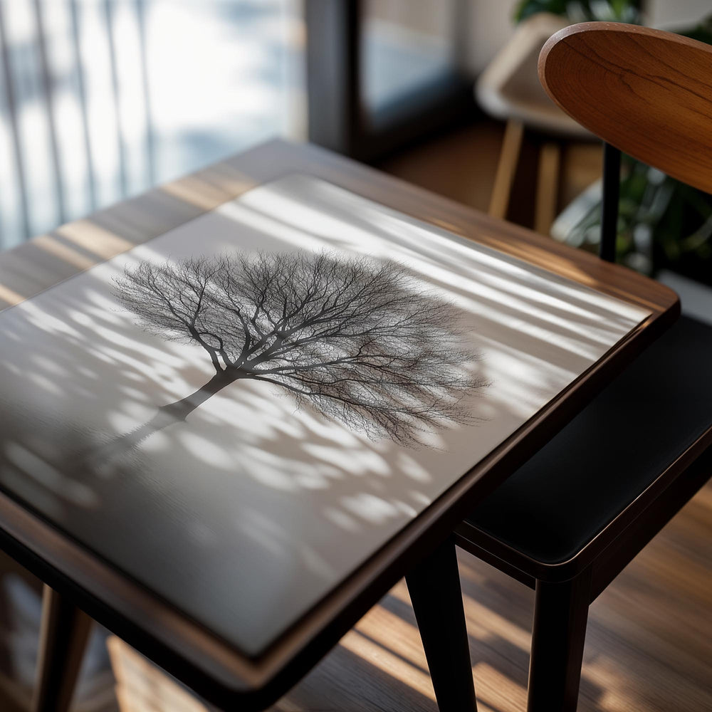 Black and white tree in a foggy landscape, as a premium aluminum metal print from GoMetalPrint.
