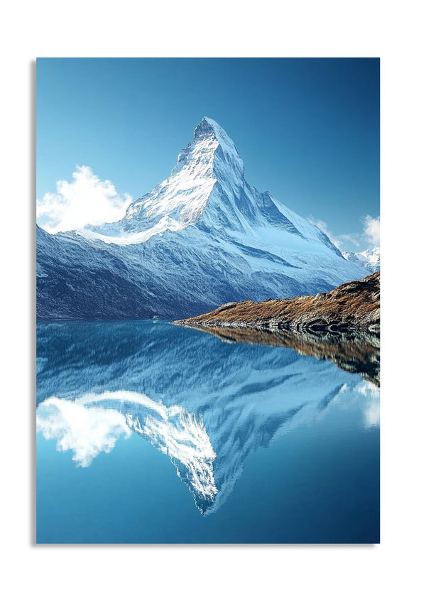 Snow-capped mountain reflected in a calm lake with a clear blue sky, as a premium aluminum metal print from GoMetalPrint.
