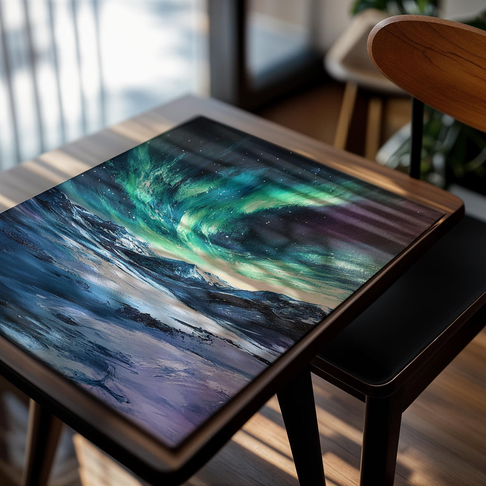 Aurora borealis over a snowy landscape with mountains, as a premium aluminum metal print from GoMetalPrint.
