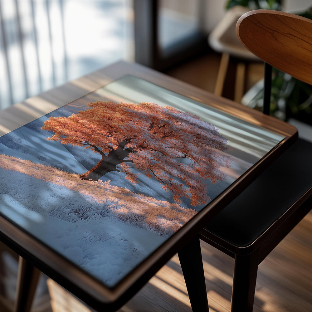 Snow-covered tree on a hillside with a soft blue sky, as a premium aluminum metal print from GoMetalPrint.
