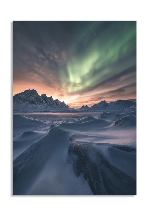 Aurora borealis over a snowy landscape with mountains, as a premium aluminum metal print from GoMetalPrint.
