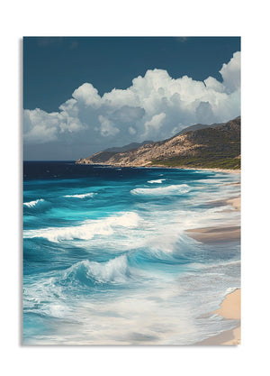 Coastal scene with blue ocean waves crashing onto a sandy beach, mountains in the background, as a premium aluminum metal print from GoMetalPrint.
