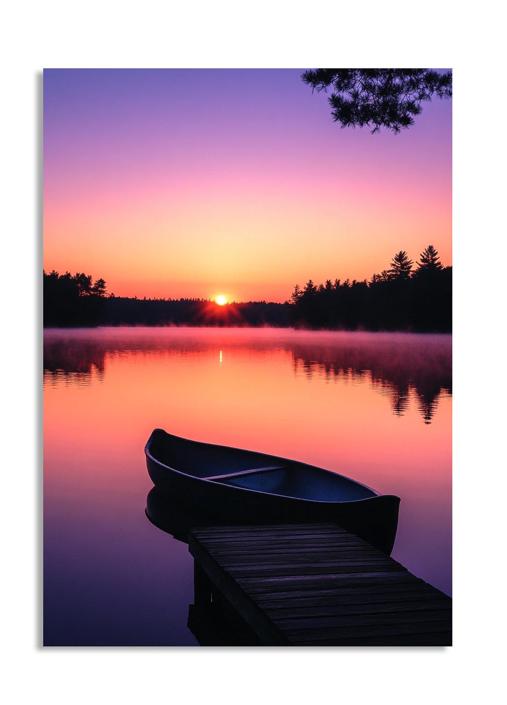 Canoe on a dock at sunset with a purple and pink sky over water, as a premium aluminum metal print from GoMetalPrint.

