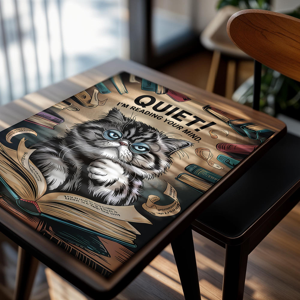 Cartoon cat reading a book with text 'QUIET! I'm reading your mind.' surrounded by books, as a premium aluminum metal print from GoMetalPrint.
