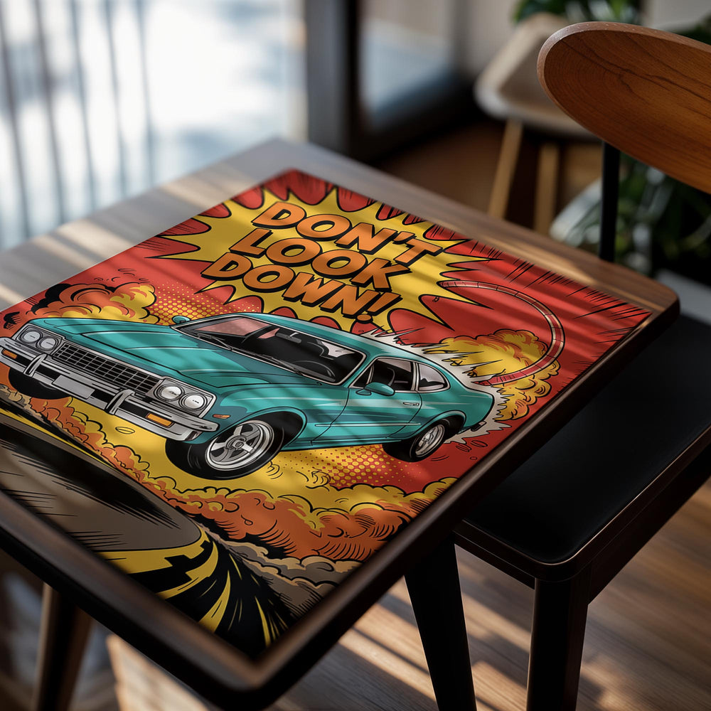 Comic-style poster with a blue car on a road, flames, and 'Don't Look Down!' text, as a premium aluminum metal print from GoMetalPrint.
